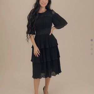 Beautiful black dress, large! Runs small! Loved it but just was a little snug